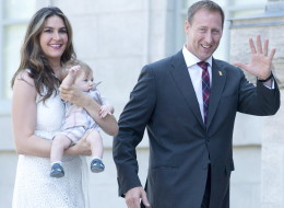 Peter MacKay, his wife Nazanin Afshin-Jam and baby Kian arrive at Rideau Hall in Ottawa on Monday, July 15, 2013. MacKay was sworn in as minister of justice. THE CANADIAN PRESS/Adrian Wyld