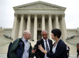 WASHINGTON, DC - APRIL 22: Aereo Vice President of Communications and Government Relations Virginia Lam (R) turns down a question from a member of the media (L) as Aereo CEO Chet Kanojia (2nd L) leaves the U.S. Supreme Court after oral arguments April 22, 2014 in Washington, DC. The Supreme Court heard arguments in a case against Aereo on the companys profiting from rebroadcasting network TVs programs obtained from public airwaves. (Photo by Alex Wong/Getty Images)