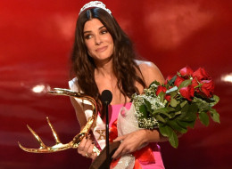 Sandra Bullock Tops Forbes' List Of Highest Paid Actresses. Here, Bullock accepts the Decade of Hotness award onstage during Spike TV's 'Guys Choice 2014' at Sony Pictures Studios on June 7 in Culver City, California. (Photo by Kevin Winter/Getty Images for Spike TV)