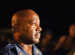 FERGUSON, MO - AUGUST 14: Capt. Ronald Johnson of the Missouri State Highway Patrol, who was appointed by the governor to take control of security operations in the city of Ferguson, walks among demonstrators gathered along West Florissant Avenue on August 14, 2014 in Ferguson, Missouri. Violent protests have erupted along West Florissant in Ferguson each of the last four nights as demonstrators express outrage over the shooting death of Michael Brown by a Ferguson police officer on August 9.Th