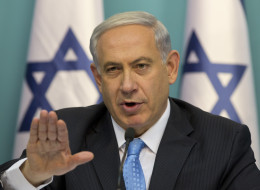 Israeli Prime Minister Benjamin Netanyahu gestures as he speaks during a press conference at the prime minister