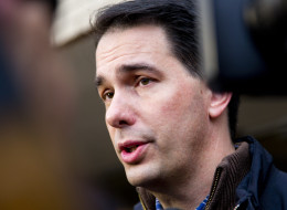 MILWAUKEE, WI - NOVEMBER 4:  Wisconsin Gov. Scott Walker talks to the media after he casts his ballot on election day at Jefferson Elementary School, November 4, 2014 in Milwaukee, Wisconsin. Walker is running in a tight race against opponent Democratic candidate for Governor Mary Burke. (Photo by Darren Hauck/Getty Images)