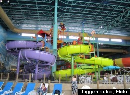 Slide down one of the many colorful slides at KeyLime Cove Indoor Waterpark Resort.