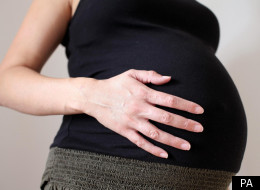 Mother gave birth in a shop doorway after midwives sent her out for lunch.