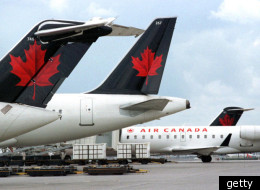Harper a vigoureusement défendu vendredi le droit du gouvernement d'intervenir pour empêcher un arrêt de travail chez Air Canada. (Photo Getty)