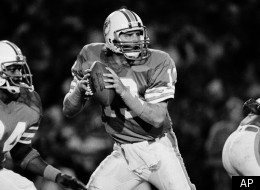Dan Marino, quarterback for the Miami Dolphins fades back to pass during the first half in Miami, Fla., Dec. 17, 1984 where he broke the season record for most yards thrown. (*AP Photo/Rayt Fairall)