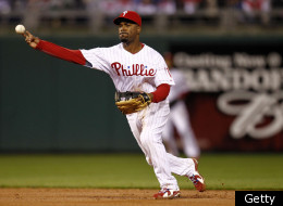 PHILADELPHIA - OCTOBER 06: Jimmy Rollins #11 of the Philadelphia Phillies throws to first in Game 1 of the NLDS against the Cincinnati Reds at Citizens Bank Park on October 6, 2010 in Philadelphia, Pennsylvania. (Photo by Jeff Zelevansky/Getty Images)