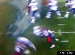 Denver's Elvis Dumervil laid out Pats quarterback Tom Brady.