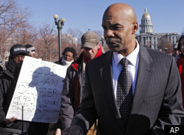 Denver Police Chief Robert White met with Occupy Denver protesters across from the Capitol in Denver on Thursday, Dec. 15, 2011. He told them that the structures at the site were against the law and if they were not taken down the law would be enforced. (AP Photo/Ed Andrieski)