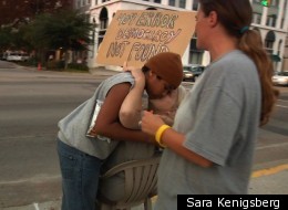 Jessica Smith, her son Dakota and her mother, Gwyndolyn Garner, at Occupy Columbia in South Carolina.
