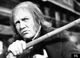 British actor Albert Finney as Ebenezer Scrooge