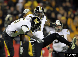 KANSAS CITY, MO - NOVEMBER 26: Quarterback James Franklin #1 of the Missouri Tigers celebrates after a touchdown during the game against the Kansas Jayhawks on November 26, 2011 at Arrowhead Stadium in Kansas City, Missouri. (Photo by Jamie Squire/Getty Images)