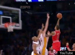 Chicago Bulls forward Luol Deng (9), of Sudan, puts up a shot as Los Angeles Lakers forward Pau Gasol, left, of Spain, looks on during the first half of their NBA basketball game, Sunday, Dec. 25, 2011, in Los Angeles. (AP Photo/Mark J. Terrill)