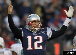FOXBORO, MA - DECEMBER 24: Tom Brady #12 of the New England Patriots reacts against the Miami Dolphins in the second half at Gillette Stadium on December 24, 2011 in Foxboro, Massachusetts. (Photo by Jim Rogash/Getty Images)