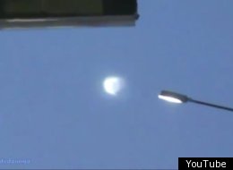 The silver sphere was filmed hovering above Trekhgorny by three separate people
