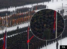 'Giant' soldier spotted at Kim Jong-Il's funeral - but is it a fake?