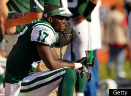 MIAMI GARDENS, FL - JANUARY 01: Plaxico Burress #17 of the New York Jets looks on during a game against the Miami Dolphins at Sun Life Stadium on January 1, 2012 in Miami Gardens, Florida. (Photo by Mike Ehrmann/Getty Images)