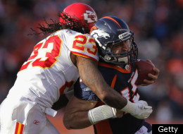 DENVER, CO - JANUARY 01: Quarterback Tim Tebow #15 of the Denver Broncos is tackled by Kendrick Lewis #23 of the Kansas City Chiefs at Sports Authority Field at Mile High on January 1, 2012 in Denver, Colorado. Tebow fumbled on the play and turned the ball over to the Kansas City Chiefs. (Photo by Doug Pensinger/Getty Images)