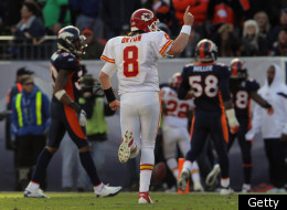 DENVER, CO - JANUARY 01: Quarterback Kyle Orton #8 of the Kansas City Chiefs gestures toward the Denver Broncos bench as running back Dexter McCluster #22 of the Kansas City Chiefs rushes 21 yards for a first quarter touchdown at Sports Authority Field at Mile High on January 1, 2012 in Denver, Colorado. (Photo by Doug Pensinger/Getty Images)