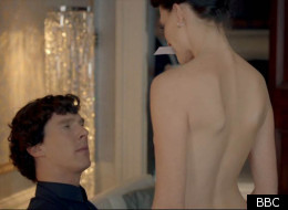 Benedict Cumberbatch is given the whipping treatment by Lara Pulver as Irene Adler in 'Sherlock'