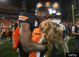 GLENDALE, AZ - JANUARY 02: Justin Blackmon #81 of the Oklahoma State Cowboys celebrates with a cheerleader after Oklahoma State Cowboys won 41-38 in overtime against the Stanford Cardinal during the Tostitos Fiesta Bowl on January 2, 2012 at University of Phoenix Stadium in Glendale, Arizona. (Photo by Donald Miralle/Getty Images)