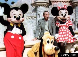 Pictured: Roy E. Disney with Mickey Mouse, Minnie Mouse and Goofy at Disneyland in a photo from 1992.