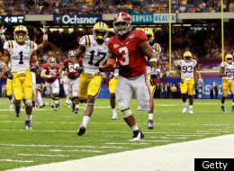 NEW ORLEANS, LA - JANUARY 09: Trent Richardson #3 of the Alabama Crimson Tide runs for a 34 yard touchdown in the fourth quarter against Morris Claiborne #17 of the Louisiana State University Tigers during the 2012 Allstate BCS National Championship Game at Mercedes-Benz Superdome on January 9, 2012 in New Orleans, Louisiana. (Photo by Ronald Martinez/Getty Images)