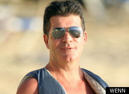 Simon Cowell has been joined on his holiday by Zeta Graff.
