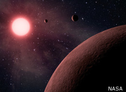 An artist's depiction of the KOI-961 planetary system