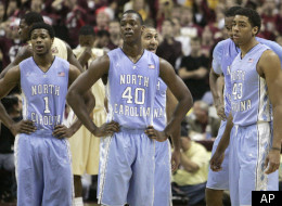 North Carolina's players from left, Dexter Strickland, Harrison Barnes, Kendall Marshall, John Henson, and James McAdoo watch as Florida State's Michael Snaer shoots a technical foul free throw in the second half of an NCAA college basketball game, Saturday, Jan. 14, 2012 in Tallahassee, Fla.(AP Photo/Steve Cannon)