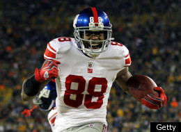 GREEN BAY, WI - JANUARY 15: Hakeem Nicks #88 of the New York Giants celebrates after making a 37 yard touchdown catch with time running out in the second quarter against the Green Bay Packers during their NFC Divisional playoff game at Lambeau Field on January 15, 2012 in Green Bay, Wisconsin. (Photo by Jamie Squire/Getty Images)