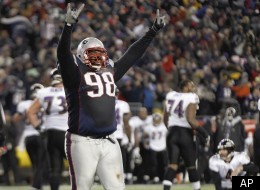 New England Patriots defensive tackle Gerard Warren celebrates after the Baltimore Ravens missed a 32-yard field goal attempt during the AFC Championship NFL football game against the Baltimore Ravens Sunday, Jan. 22, 2012, in Foxborough, Mass. The Patriots defeated the Ravens 23-20 to win the AFC Championship. (AP Photo/Elise Amendola)