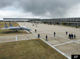 In this Friday, Jan. 20, 2012 photo, cadets head to class on the campus at the Air Force Academy near Colorado Springs, Colo. Nine years after a sexual assault scandal at the Air Force Academy sent shock waves across the military, the Defense Department reported a spike in newly reported assaults at the school and the Air Force filed sex-crime charges against three cadets. (AP Photo/Ed Andrieski)
