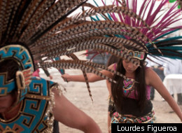 Eugenio Martinez and Maria Guadalupe Martinez, members of Danza Azteca Tonantzin, dance at the Virgin of Guadalupe celebration in Marin County.
