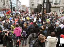 A group of wheelchair bound protesters chain themselves together across Regent Street in Oxford Circus, London