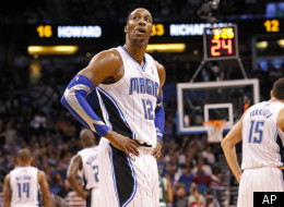 Orlando Magic's Dwight Howard (12) reacts during the second half of an NBA basketball game against the Boston Celtics, Thursday, Jan. 26, 2012, in Orlando, Fla. The Celtics won 91-83. (AP Photo/Mike Carlson)