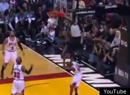 LeBron jumps over a defender for an incredible alley-oop.