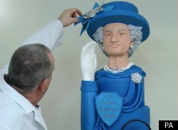 The Queen cake is four feet tall and weighs 15 kilos
