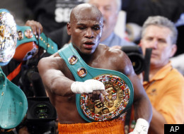 Floyd Mayweather celebrates his victory over Victor Ortiz shortly after their WBC welterweight title boxing match, Saturday, Sept. 17, 2011, at The MGM Grand Garden Arena in Las Vegas. (AP Photo/Eric Jamison)
