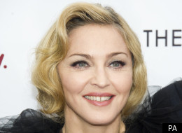 Madonna thinks fans shouldn't grumble at the price of her tickets, and start saving instead