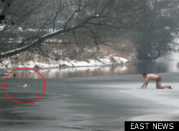 A man stripped off to his underwear to rescue his dog from the frozen lake
