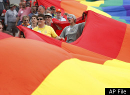 Participants march with a 900-foot-long rainbow flag during the Southern Maine Pride parade, Saturday, June 20, 2009, in Portland, Maine. Maine became the fifth state to allow gay marriage last month. (AP Photo/Robert F. Bukaty)