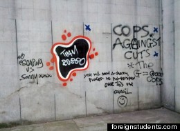The handiwork of 'Team Robbo' at the base of Banksy's 'Shop Till You Drop'