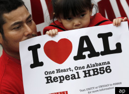 Opponents of Alabama's immigration law outside the Statehouse in Montgomery, Ala., on Feb. 14 was calling for the repeal of HB56. (AP Photo/Dave Martin)