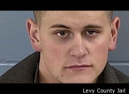 John Champion allegedly robbed a store at Knifepoint and got his wheelchair stuck during his getaway.