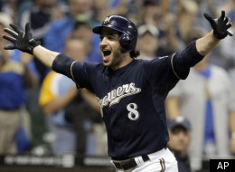 Milwaukee Brewers' Ryan Braun reacts after hitting a game-winning home run during the 11th inning of a baseball game against the Colorado Rockies on Tuesday, Sept. 13, 2011, in Milwaukee. The Brewers won 2-1. (AP Photo/Morry Gash)