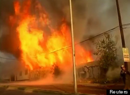 A forest fire in Viña del Mar, Chile, has engulfed and burned through 73 homes already. (Reuters)