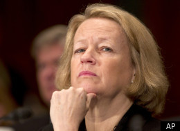 Mary Schapiro, chairman of the Securities and Exchange Commission. The SEC may bring enforcement actions against Wells Fargo and Goldman Sachs for actions related to bonds backed by subprime mortgages.