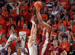 Florida State guard Ian Miller (30) shoots over Virginia guard Sammy Zeglinski (13) in the final seconds of an NCAA college basketball game Thursday, March 1, 2012, in Charlottesville, Va. Florida State defeated Virginia 63-60. (AP Photo/Andrew Shurtleff)