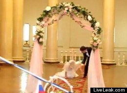 Bride falls over as she walks up the aisle